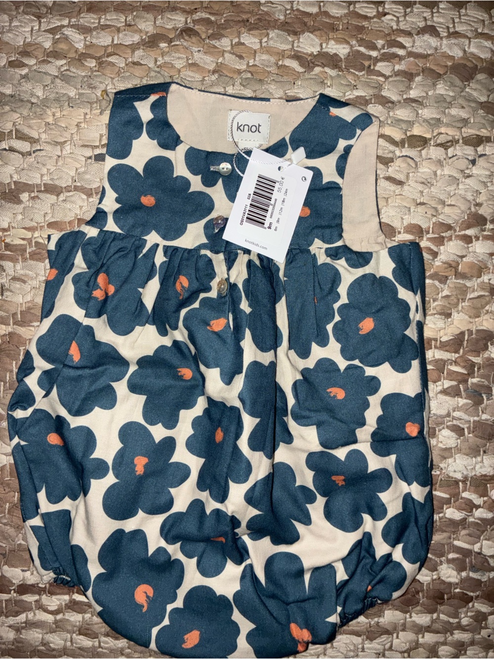 Knot Floral Baby One-Piece in Navy and Cream with Orange Accents